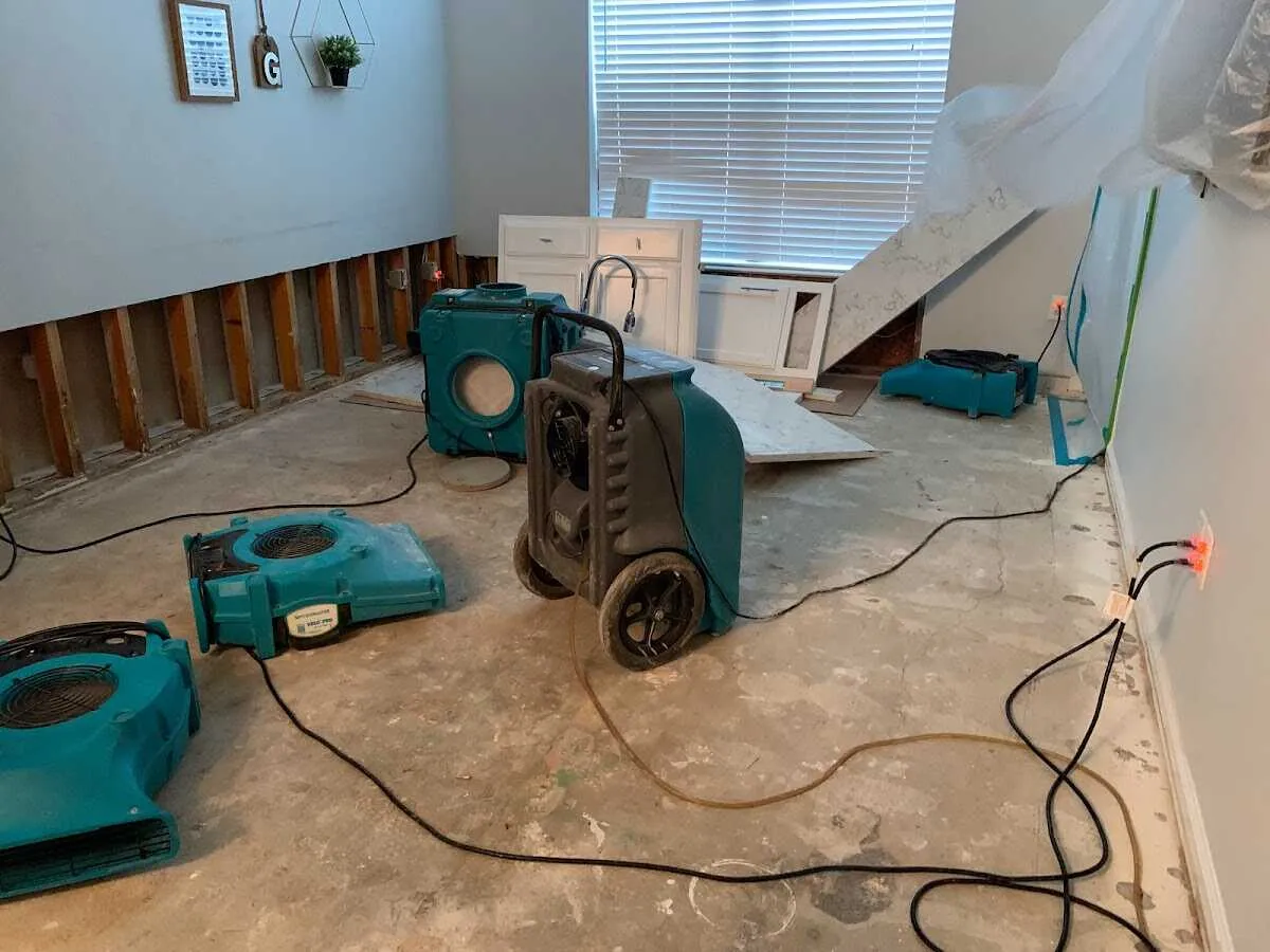 Dehumidifier in flood-cut room for Water Damage Restoration in Moorefield